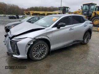 2023 Lexus RZ 450e Premium z VIN JTJAAAAB9PA007148, wystawiony jako Copart lot #51994935 z przebiegiem Nie podano mil oraz Szkoda całkowita • Salvage title. Historia ofert i sprzedaży dostępna na DreamBid. Obrazek 1.