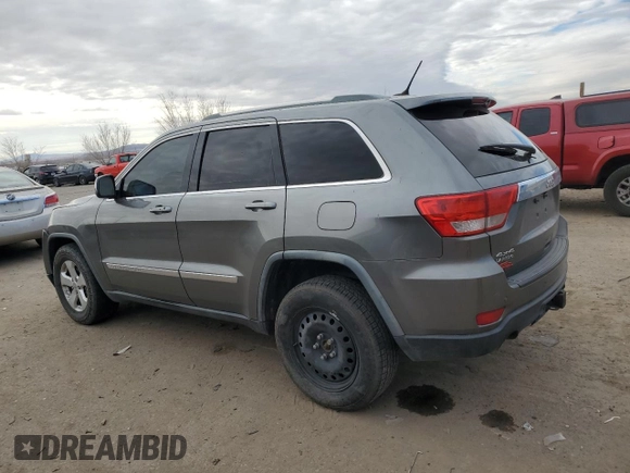 2012 Jeep Grand Cherokee Laredo with VIN 1C4RJFAT3CC204245, listed as a Copart auction lot 41707195 with 172,014 mi miles and Salvage Title. Bid and sale history available at carsss.com. Image 2.