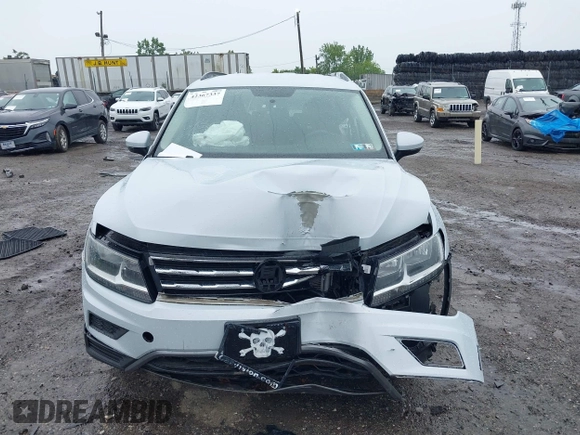 2019 Volkswagen Tiguan S with VIN 3VV0B7AX7KM031438, listed as a IAAI auction lot 42367337 with Not provided miles and . Bid and sale history available at DreamBid. Image 12.