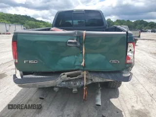 1999 Ford F-150 with VIN 1FTRX18W8XNB82710, listed as a Copart auction lot 58264745 with Not provided miles and Salvage title. Bid and sale history available at DreamBid. Image 6.
