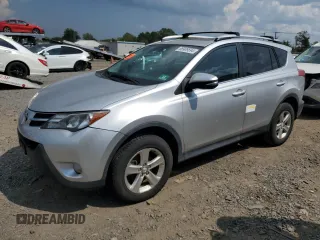 2014 Toyota RAV4 XLE with VIN 2T3RFREV3EW157703, listed as a Copart auction lot 68909594 with 69,305 mi miles and Salvage Title. Bid and sale history available at carsss.com. Image 1.