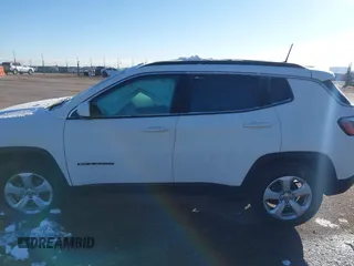 2019 Jeep Compass Latitude with VIN 3C4NJDBB5KT704564, listed as a IAAI auction lot 40768531 with 95,291 mi miles. Bid and sale history available at carsss.com. Image 14.