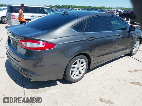 2015 Ford Fusion SE with VIN 3FA6P0H77FR160172, listed as a IAAI auction lot 42088402 with 175,360 mi miles. Bid and sale history available at carsss.com. Image 4.