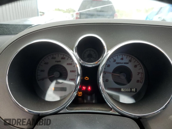 2009 Pontiac Solstice z VIN 1G2MN35B69Y105093, wystawiony jako Copart lot #72854034 z przebiegiem 82 333 mil mil oraz Szkoda całkowita • Salvage title. Historia ofert i sprzedaży dostępna na DreamBid. Obrazek 9.