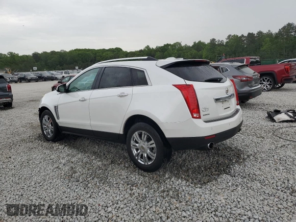 2015 Cadillac SRX Luxury Collection with VIN 3GYFNBE32FS581541, listed as a Copart auction lot 54134415 with 154,372 mi miles and Salvage Title. Bid and sale history available at DreamBid. Image 2.