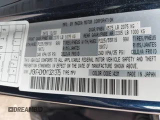 2021 Mazda CX-5 Grand Touring with VIN JM3KFADM0M1321375, listed as a IAAI auction lot 41913449 with 88,178 mi miles. Bid and sale history available at carsss.com. Image 9.