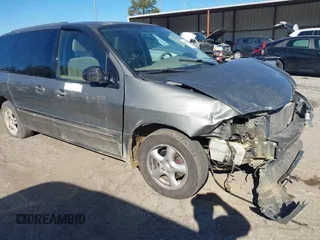 2003 Ford Windstar SE with VIN 2FMZA52473BB65706, listed as a IAAI auction lot 41300897 with 160,965 mi miles and . Bid and sale history available at DreamBid. Image 14.