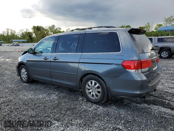 2010 Honda Odyssey EX-L with VIN 5FNRL3H73AB099787, listed as a Copart auction lot 52482325 with 235,785 mi miles and Salvage Title. Bid and sale history available at DreamBid. Image 2.