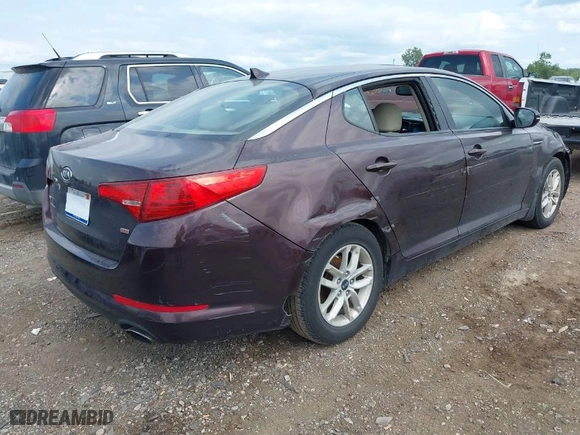 2011 Kia Optima LX with VIN KNAGM4A73B5063778, listed as a IAAI auction lot 39932051 with 143,175 mi miles. Bid and sale history available at carsss.com. Image 4.