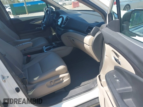 2019 Honda Pilot EX-L with VIN 5FNYF5H57KB038019, listed as a IAAI auction lot 41994410 with 126,738 mi miles and . Bid and sale history available at carsss.com. Image 5.