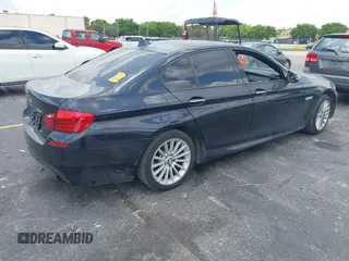 2016 BMW 5 Series 535i xDrive with VIN WBA5B3C5XGG256900, listed as a IAAI auction lot 42333358 with 128,904 mi miles and . Bid and sale history available at DreamBid. Image 4.