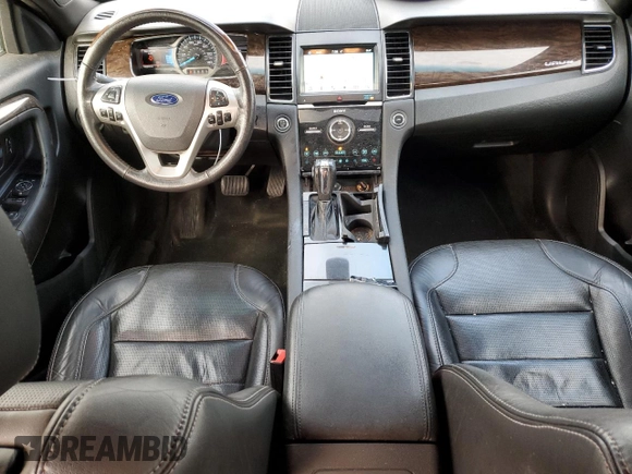 2017 Ford Taurus Limited with VIN 1FAHP2J88HG102721, listed as a Copart auction lot 77889724 with 108,224 mi miles and Salvage Title. Bid and sale history available at DreamBid. Image 8.
