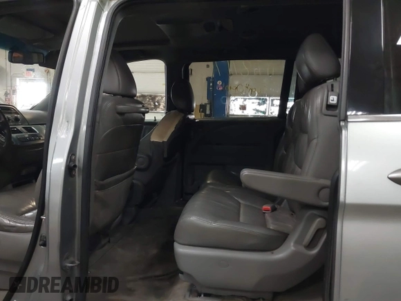 2008 Honda Odyssey EX-L with VIN 5FNRL38738B030818, listed as a IAAI auction lot 41718717 with 247,994 mi miles and . Bid and sale history available at DreamBid. Image 8.