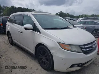 2016 Honda Odyssey EX-L with VIN 5FNRL5H68GB128552, listed as a IAAI auction lot 41947677 with 213,255 mi miles and . Bid and sale history available at DreamBid. Image 1.
