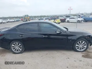 2015 Infiniti Q50 Premium z VIN JN1BV7AP3FM347065, wystawiony jako IAAI lot #41926070 z przebiegiem 110 487 mil mil oraz . Historia ofert i sprzedaży dostępna na DreamBid. Obrazek 14.