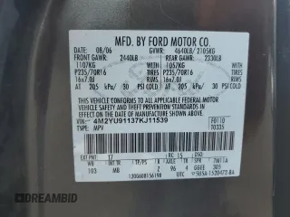 2007 Mercury Mariner Luxury with VIN 4M2YU91137KJ11539, listed as a Copart auction lot 64846175 with 139,488 mi miles and Salvage title. Bid and sale history available at DreamBid. Image 13.
