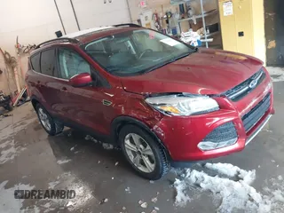 2014 Ford Escape SE with VIN 1FMCU9GX4EUD74843, listed as a IAAI auction lot 41484187 with 104,326 mi miles and . Bid and sale history available at DreamBid. Image 1.