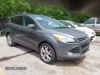 2013 Ford Escape SEL with VIN 1FMCU0H96DUC33699, listed as a IAAI auction lot 42779073 with 120,992 mi miles and . Bid and sale history available at DreamBid. Image 1.