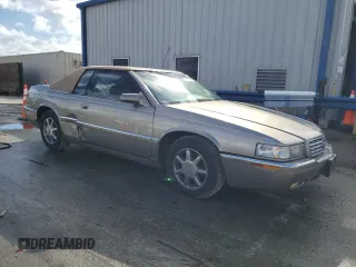 2000 Cadillac Eldorado z VIN 1G6EL12Y7YB703863, wystawiony jako Copart lot #85433244 z przebiegiem 175 416 mil mil oraz Szkoda całkowita • Salvage title. Historia ofert i sprzedaży dostępna na DreamBid. Obrazek 4.
