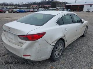 2015 Mazda 6 i Sport with VIN JM1GJ1U57F1183035, listed as a IAAI auction lot 41384011 with 152,172 mi miles. Bid and sale history available at carsss.com. Image 4.