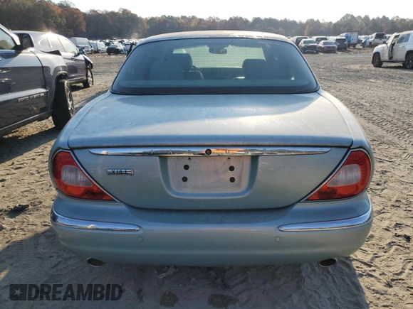 2005 Jaguar XJ with VIN SAJWA79C15SG48962, listed as a Copart auction lot 75674034 with 0 mi miles and Salvage Title. Bid and sale history available at carsss.com. Image 6.