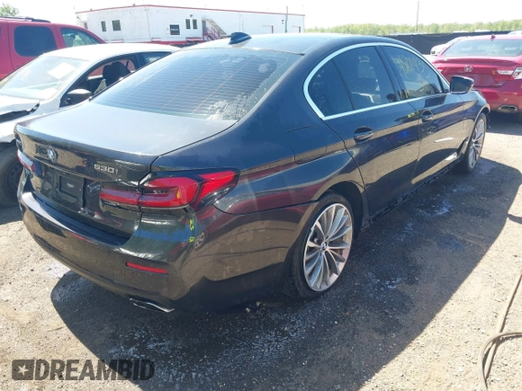 2021 BMW 5 Series 530i xDrive with VIN WBA13BJ0XMWX00677, listed as a IAAI auction lot 42100435 with 66,140 mi miles and . Bid and sale history available at DreamBid. Image 4.