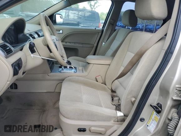 2006 Ford Five Hundred SE с VIN 1FAFP23146G150401, выставлен на аукционе Copart как лот 57000605 с пробегом 218 689 миль миль и Списание • Salvage title. История ставок и продаж доступна на DreamBid. Изображение 7.