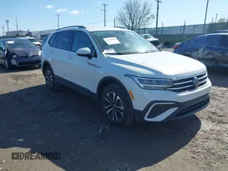 2024 Volkswagen Tiguan S with VIN 3VVFB7AX7RM063715, listed as a IAAI auction lot 41974650 with 23,374 mi miles and . Bid and sale history available at DreamBid. Image 1.