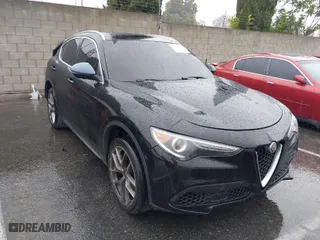 2018 Alfa Romeo Stelvio with VIN ZASFAKANXJ7C23921, listed as a IAAI auction lot 38783836 with 93,482 mi miles. Bid and sale history available at carsss.com. Image 1.