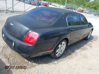 2006 Bentley Flying Spur z VIN SCBBR53W06C039791, wystawiony jako IAAI lot #42295068 z przebiegiem 48 739 mil mil oraz . Historia ofert i sprzedaży dostępna na DreamBid. Obrazek 4.
