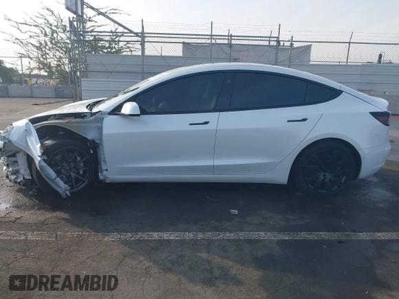 2021 Tesla Model 3 Long Range with VIN 5YJ3E1EB0MF009965, listed as a IAAI auction lot 41478233 with 31,713 mi miles and . Bid and sale history available at DreamBid. Image 14.