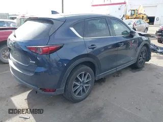 2017 Mazda CX-5 Grand Touring with VIN JM3KFBDL3H0149397, listed as a IAAI auction lot 41085425 with 161,675 mi miles. Bid and sale history available at carsss.com. Image 4.