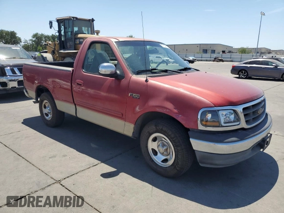 2000 Ford F-150 XL with VIN 2FTZF172XYCA85601, listed as a Copart auction lot 59134645 with Not provided miles and Salvage title. Bid and sale history available at DreamBid. Image 4.