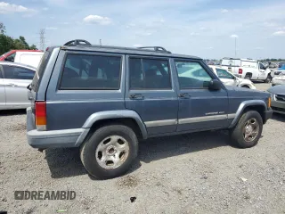 2001 Jeep Cherokee Sport with VIN 1J4FT48S31L596648, listed as a Copart auction lot 54101345 with 190,688 mi miles and Clean title. Bid and sale history available at DreamBid. Image 3.