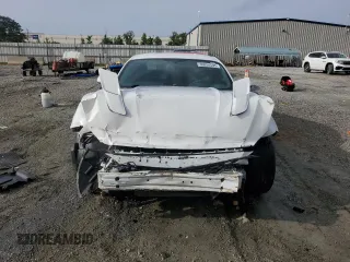 2015 Ford Mustang V6 with VIN 1FA6P8AM2F5358062, listed as a Copart auction lot 60034595 with 128,750 mi miles and Salvage title. Bid and sale history available at DreamBid. Image 5.