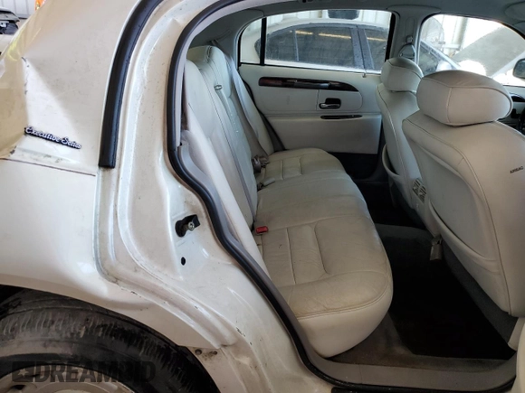 1999 Lincoln Town Car Executive with VIN 1LNHM81W2XY658371, listed as a Copart auction lot 60249045 with 191,266 mi miles and Salvage title. Bid and sale history available at DreamBid. Image 10.