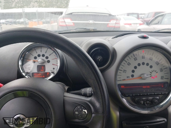 2012 MINI Countryman with VIN WMWZB3C59CWM06836, listed as a IAAI auction lot 41690459 with 172,163 mi miles and . Bid and sale history available at DreamBid. Image 7.