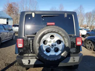 2014 Jeep Wrangler Sahara with VIN 1C4AJWBG9EL102983, listed as a Copart auction lot 84501554 with 120,372 mi miles and Salvage Title. Bid and sale history available at DreamBid. Image 6.