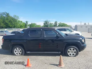 2008 Honda Ridgeline RTL z VIN 2HJYK16518H541213, wystawiony jako IAAI lot #42297012 z przebiegiem 194 098 mil mil oraz . Historia ofert i sprzedaży dostępna na DreamBid. Obrazek 13.