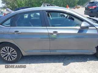 2019 Volkswagen Jetta SEL z VIN 3VWE57BU0KM110267, wystawiony jako IAAI lot #42161272 z przebiegiem 63 955 mil mil oraz . Historia ofert i sprzedaży dostępna na DreamBid. Obrazek 13.