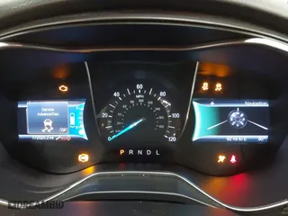 2015 Ford Fusion Titanium Hybrid with VIN 3FA6P0RU2FR309074, listed as a IAAI auction lot 41240630 with 172,025 mi miles. Bid and sale history available at carsss.com. Image 7.