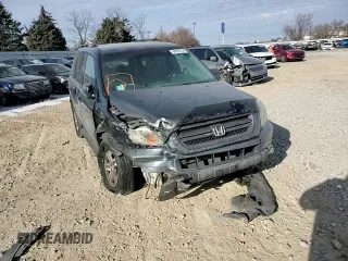 2003 Honda Pilot EX z VIN 2HKYF18723H565883, wystawiony jako Copart lot #84520794 z przebiegiem Nie podano mil oraz Szkoda całkowita • Salvage title. Historia ofert i sprzedaży dostępna na DreamBid. Obrazek 11.