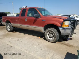 1999 Ford F-250 XL with VIN 1FTNX21SXXEE40026, listed as a Copart auction lot 69888634 with 215,535 mi miles and Salvage title. Bid and sale history available at DreamBid. Image 4.