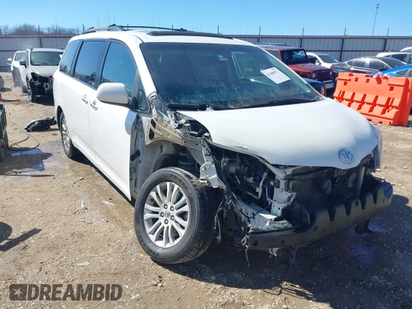 2015 Toyota Sienna XLE with VIN 5TDYK3DC7FS661582, listed as a IAAI auction lot 41688972 with 145,953 mi miles. Bid and sale history available at carsss.com. Image 1.