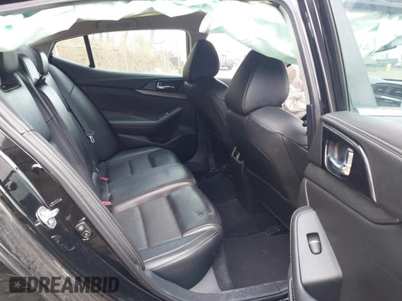 2018 Nissan Maxima SV with VIN 1N4AA6AP3JC366041, listed as a IAAI auction lot 41848298 with 79,724 mi miles and . Bid and sale history available at DreamBid. Image 8.