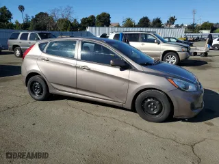 2014 Hyundai Accent GS with VIN KMHCT5AE1EU157401, listed as a Copart auction lot 87669115 with 139,984 mi miles and Salvage Title. Bid and sale history available at carsss.com. Image 4.