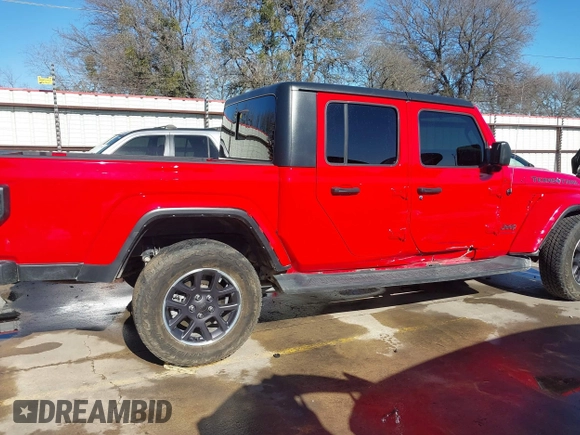 2021 Jeep Gladiator Freedom z VIN 1C6HJTAG7ML609661, wystawiony jako IAAI lot #41410756 z przebiegiem 44 636 mil mil oraz . Historia ofert i sprzedaży dostępna na DreamBid. Obrazek 13.