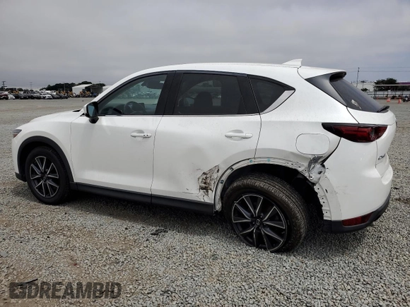 2018 Mazda CX-5 Grand Touring with VIN JM3KFADMXJ1358221, listed as a Copart auction lot 59746545 with 54,094 mi miles and Salvage title. Bid and sale history available at DreamBid. Image 2.