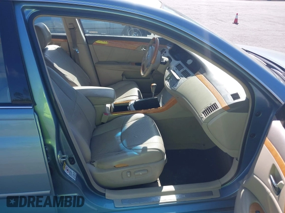 2006 Toyota Avalon XL with VIN 4T1BK36B36U147987, listed as a IAAI auction lot 42025616 with 247,270 mi miles. Bid and sale history available at carsss.com. Image 5.
