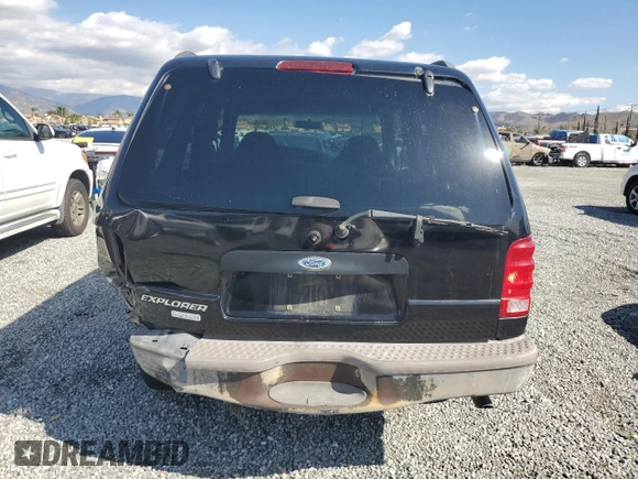 2001 Ford Explorer Sport z VIN 1FMYU60E51UA68984, wystawiony jako Copart lot #72811394 z przebiegiem 175 637 mil mil oraz Szkody całkowita. Historia ofert i sprzedaży dostępna na DreamBid. Obrazek 6.